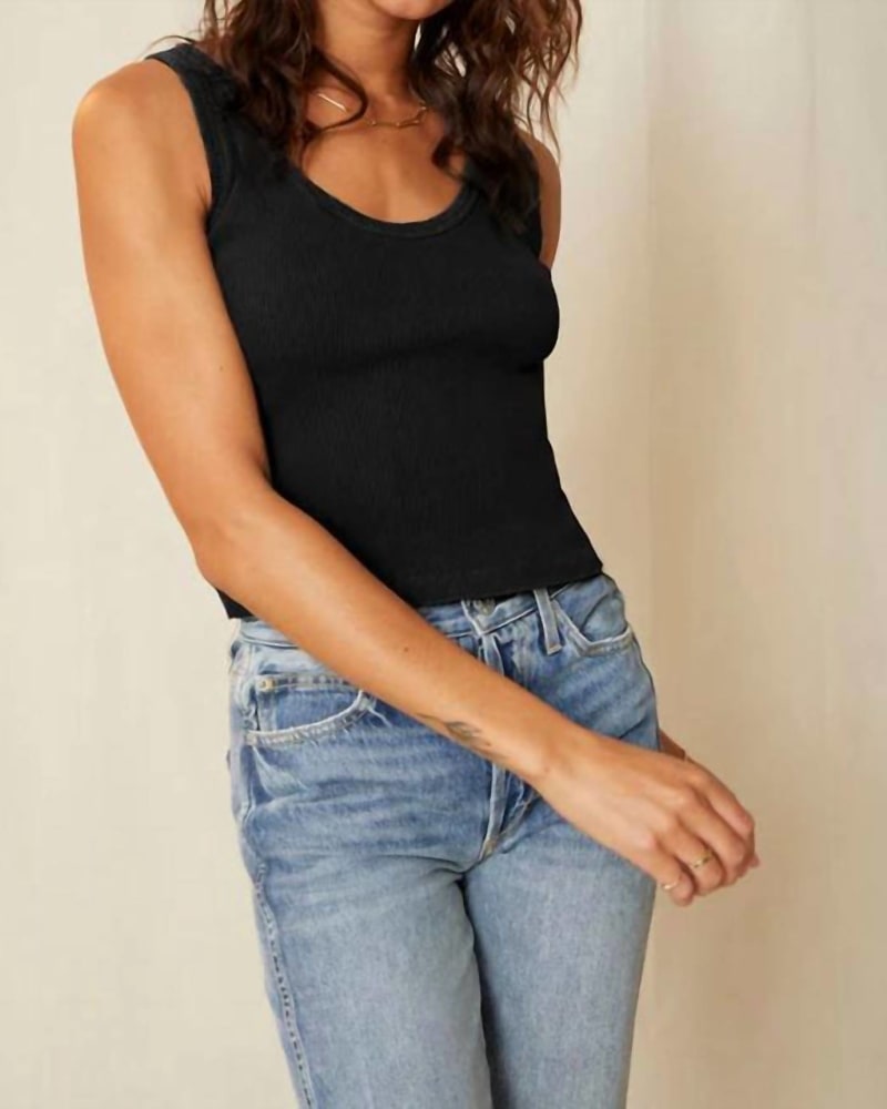 Front of a model wearing a size L Crop Rib Tank in Black in Black by AMO. | dia_product_style_image_id:343138